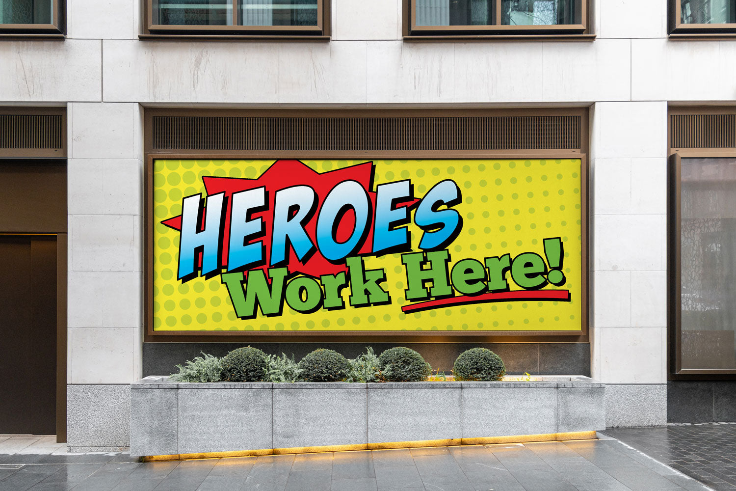 Heros work here printed on exterior banner